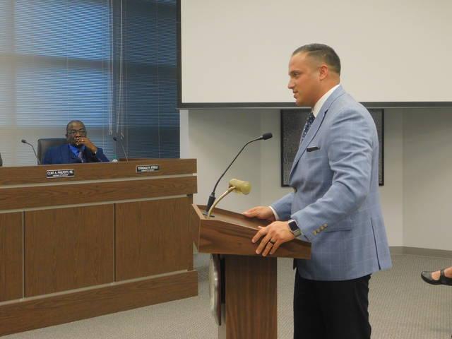 Sherman Police Chief Zachary Flores speaks before the Sherman City Council Monday night. The department is seeking to purchase a armored vehicle for the department using drug seizure funds. Photo copyright Herald Democrat / Michael Hutchins