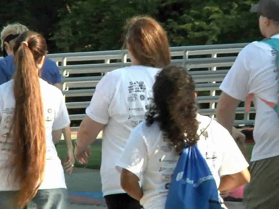 Participants in the Texoma Caregiver Celebration Walk at Grayson College. (KTEN)